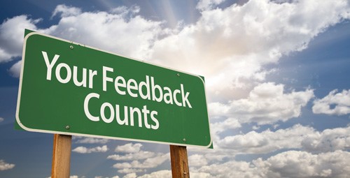 bilboard sign that says your feedback counts
